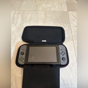 Nintendo Switch with  Black Case